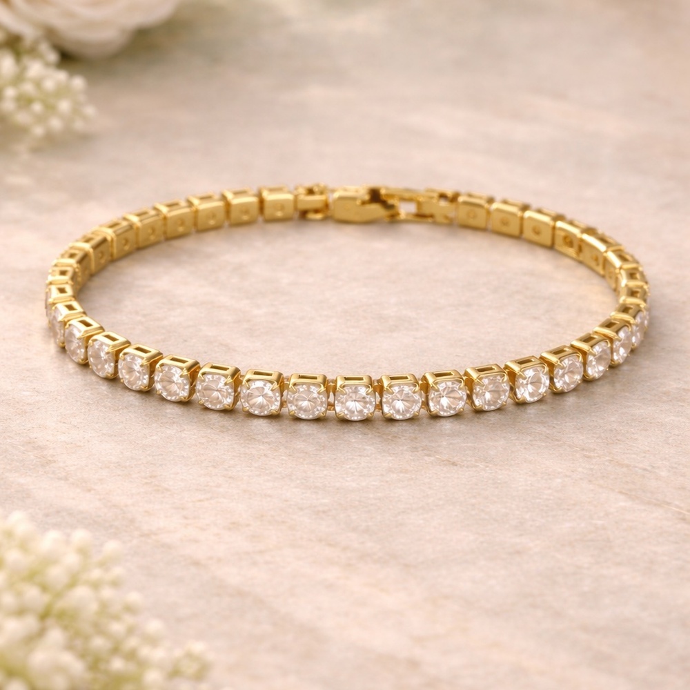 14k gold tennis bracelet with brilliant cut stones